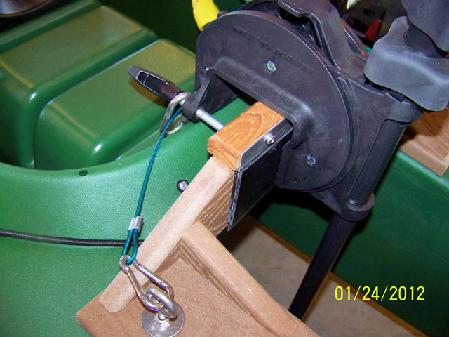 electric trolling motor mounted on fishing kayak transom mount